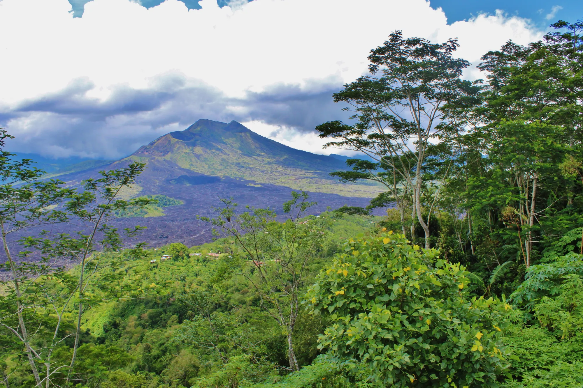 Mount Batur across its old lava field, seen from the Kintamani rim