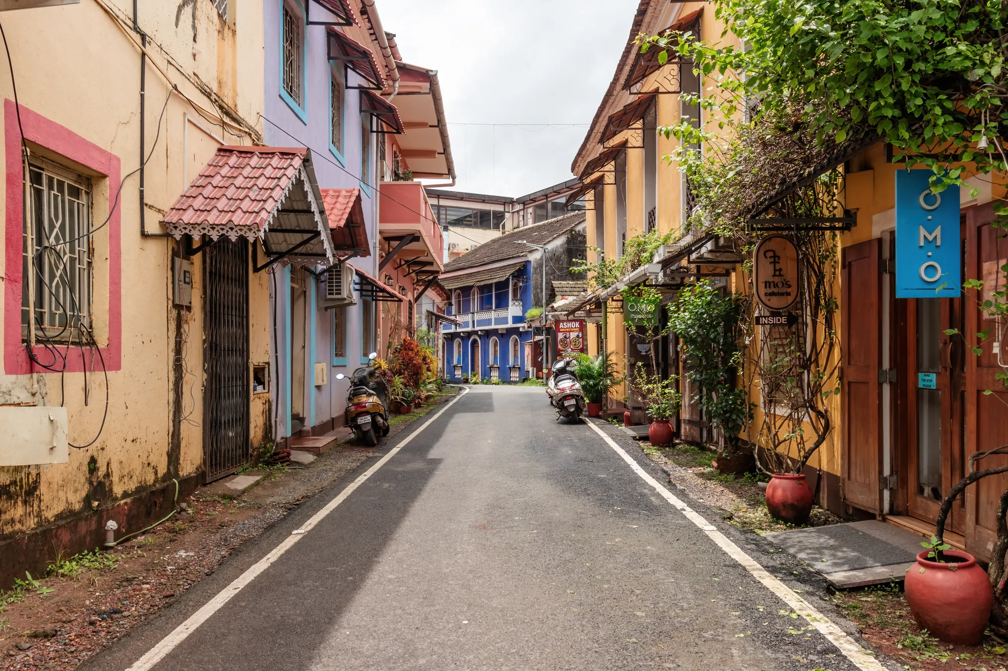 A lane in the Fontainhas Latin Quarter of Panaji, Portuguese houses in ochre, pink and blue