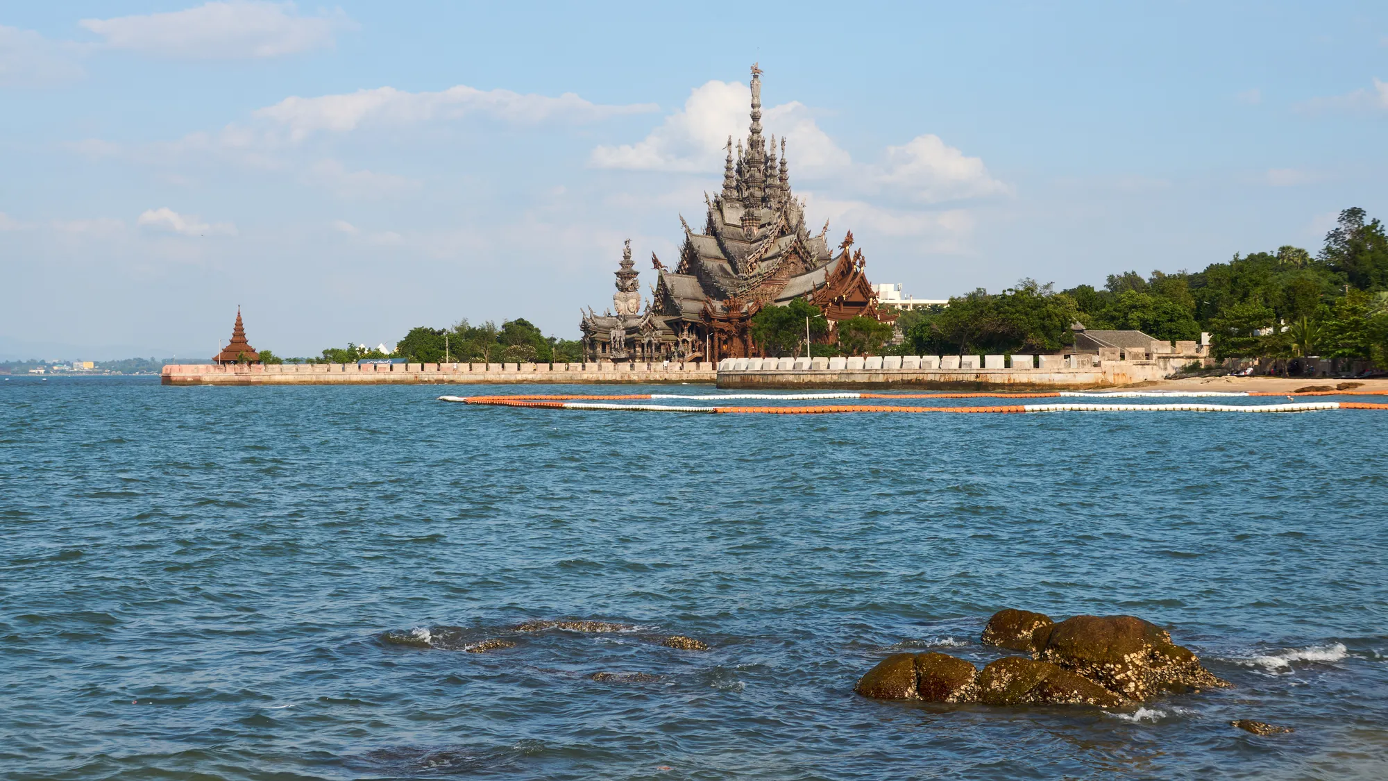 The carved teak Sanctuary of Truth on its point at Pattaya, seen from the water